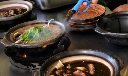 Cover Enjoying delicious food in the city of Chumphon....